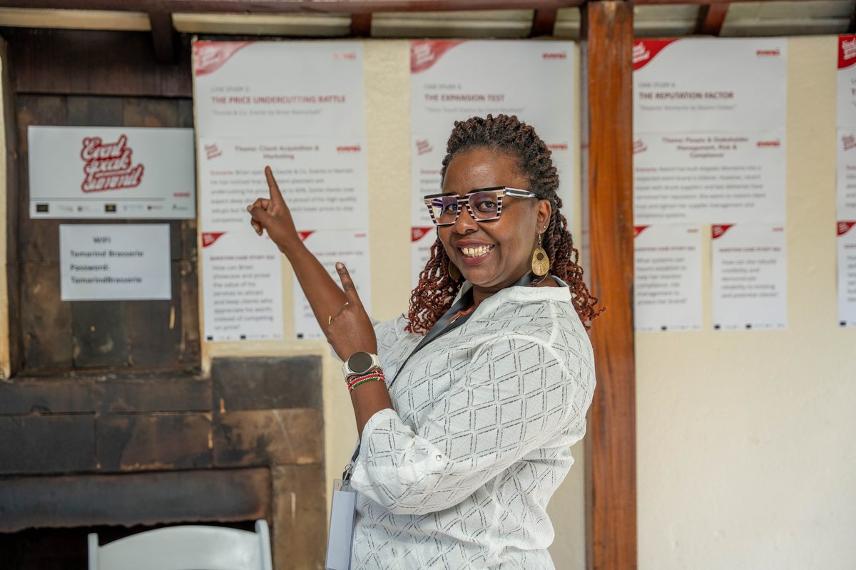A delegate at the case-study wall at the Event Speak Summit 2025
