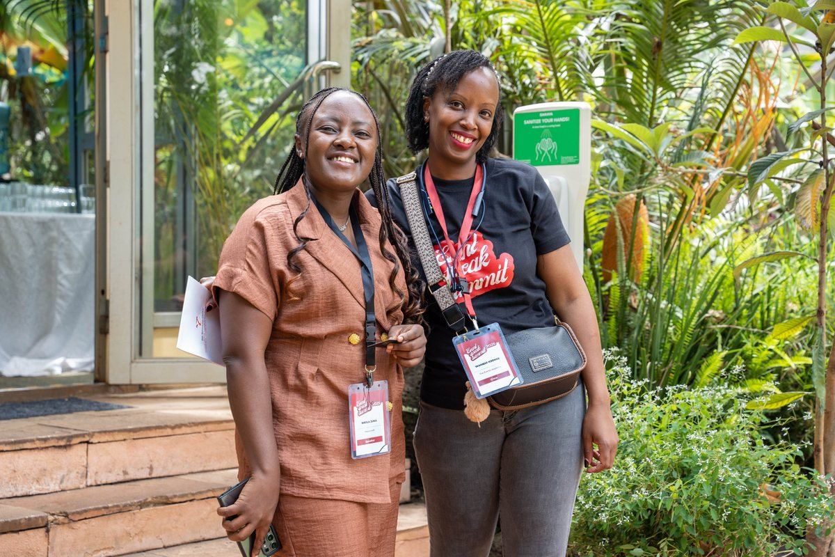 A speaker and a crew member at the Event Speak Summit 2025